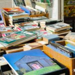 Vibrant collection of second-hand books displayed at a street stall in Moscow, Russia.